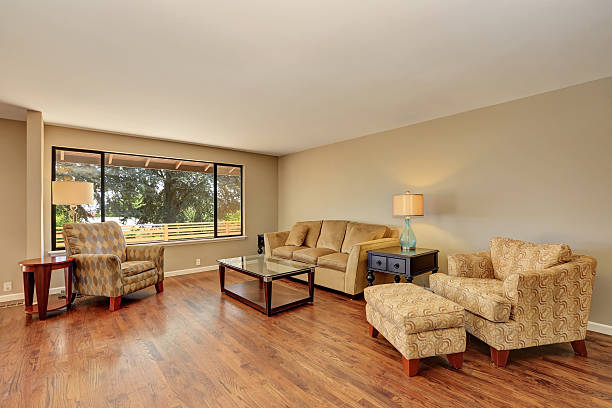istock Simple and cozy family room with brick wall and fireplace 588962440