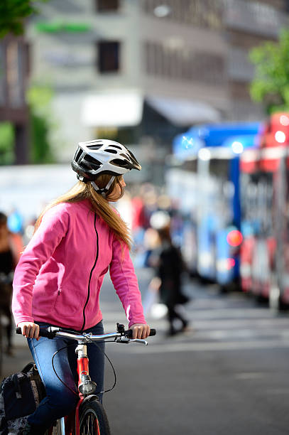 istock Swedish girl and bicycle in traffic 588962610