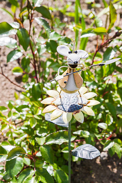 istock Garden metal mouse with a shovel 588964018