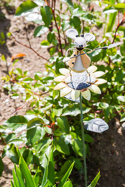 istock Garden metal mouse with a shovel 588964056