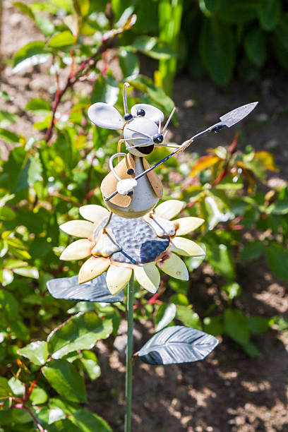 istock Garden metal mouse with a shovel 588964108
