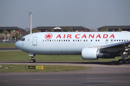 London, UK - April 16, 2014: Air Canada Boeing 767 after landing at London Heathrow airport. Air Canada is the largest airline of Canada with 35.8 million passengers carried in 2013.