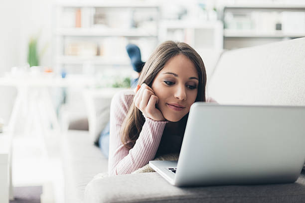istock Woman relaxing on the sofa 588966022