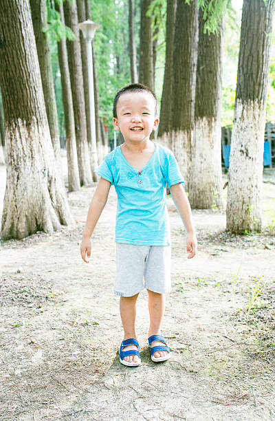 istock Cute children playing in the park 588966058