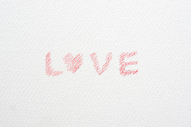 istock love word on a paper drawings. 588967618