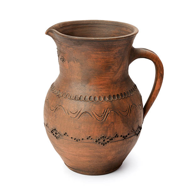 istock Clay jug isolated on white 588968654