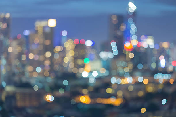 istock Abstract blurred lights urban city downtown background 588970636