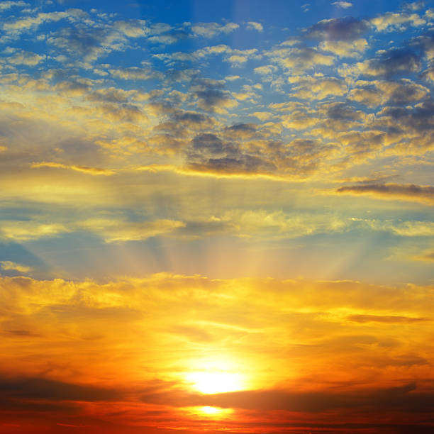 istock Sunset over the horizon. Sky with colored clouds. 588971118