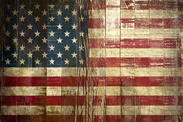 istock Flag of USA, painted on a grunge plank, 588972454
