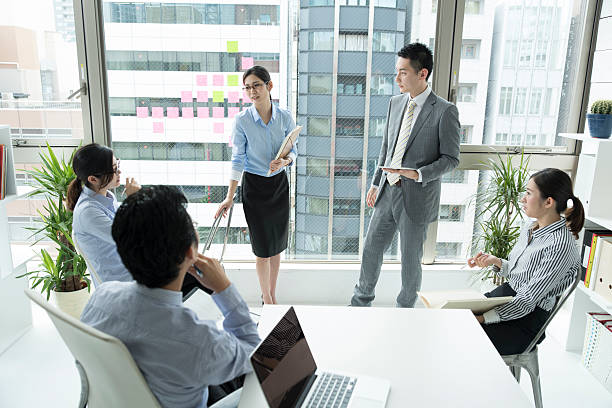 istock man and a woman to have a leadership. 588973304