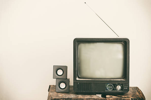 istock Retro old television on table. Vintage retro style. 588974156
