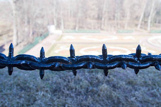Decorative fence hanging chain obstruction