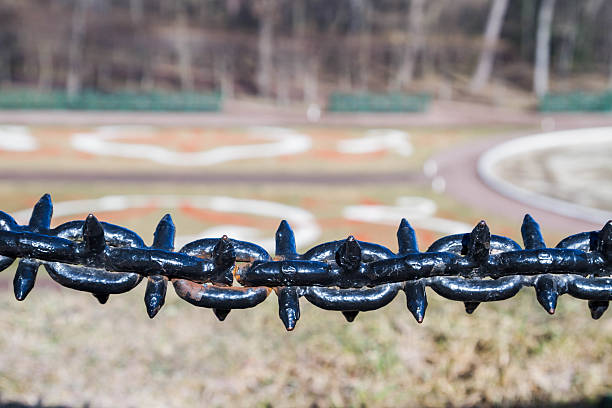 istock Decorative fence hanging chain obstruction 588974910