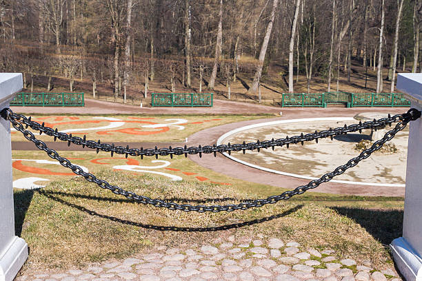 Decorative fence hanging chain obstruction