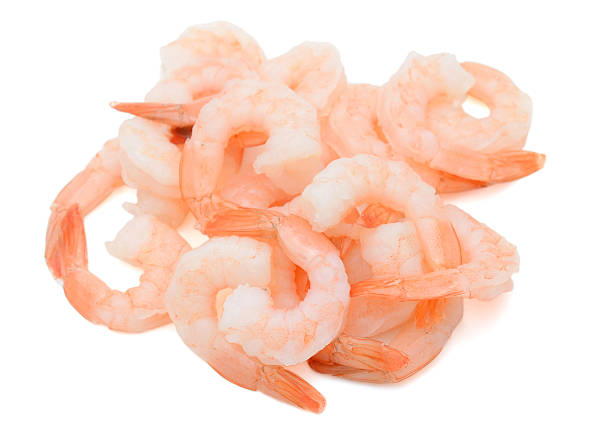 cooked peeled tiger shrimps isolated on white cooked peeled tiger shrimps isolated on white black tiger shrimp stock pictures, royalty-free photos & images