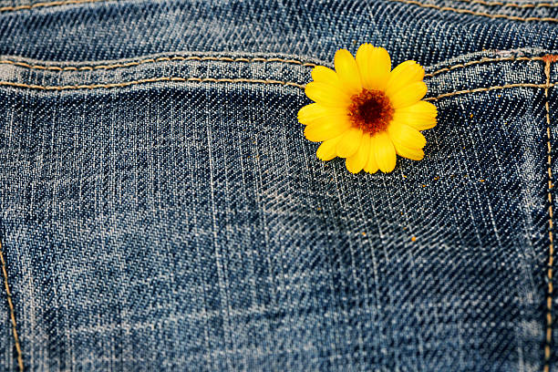 istock denim fabric with yellow flower 588975688