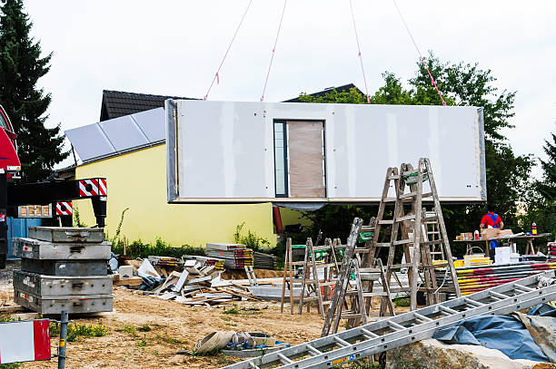 istock Assembly of prefabricated house 588977356
