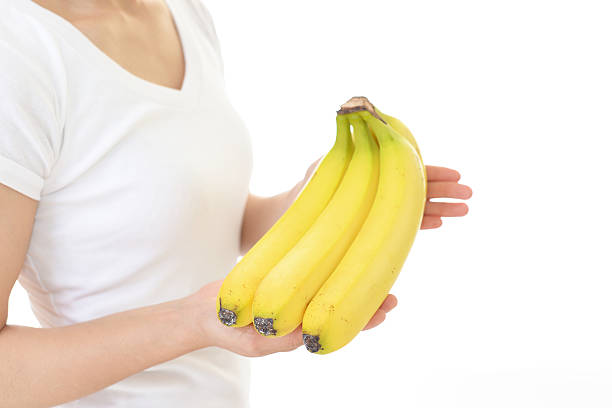 istock Woman holding fruits 588978034
