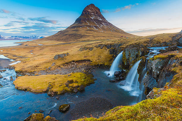 istock Kirkjufell Volcano Mountain with waterfalls 588979286