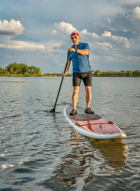 istock stand up paddling in Colorado 588979466