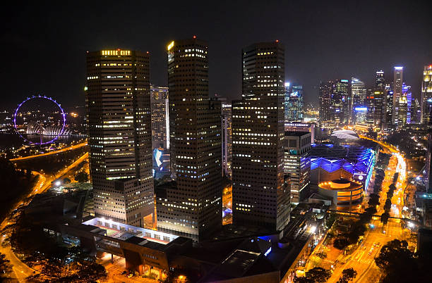 istock Singapore skyline at night. 588979568