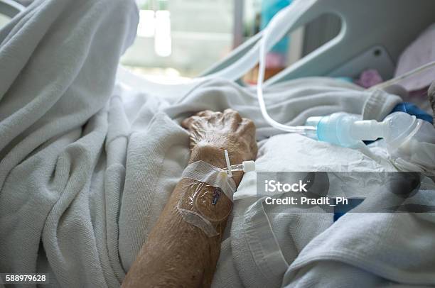 Elder Patients Hand And Blood Test Tube Stock Photo - Download Image Now - Death, Hospital, Patience