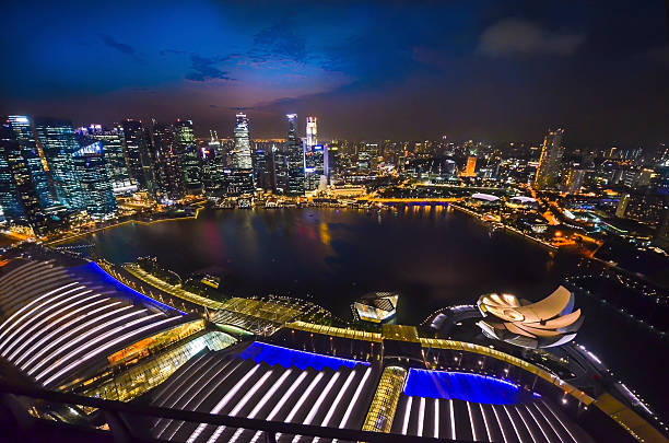 istock Singapore skyline at night. 588981816