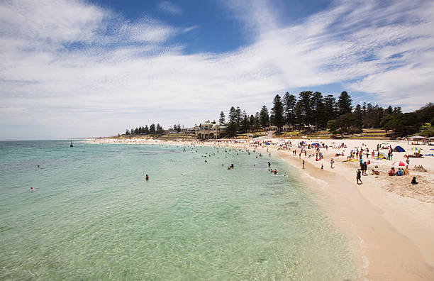 Perth Cottesloe Beach A sunny Summer's day on the popular Cottesloe beach between Perth and Fremantle in Western Australia cottesloe beach stock pictures, royalty-free photos & images