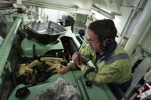 Ship Engineerjob Marine Engineer Working On A Ships Diesel Engine Stock Photo - Download ...