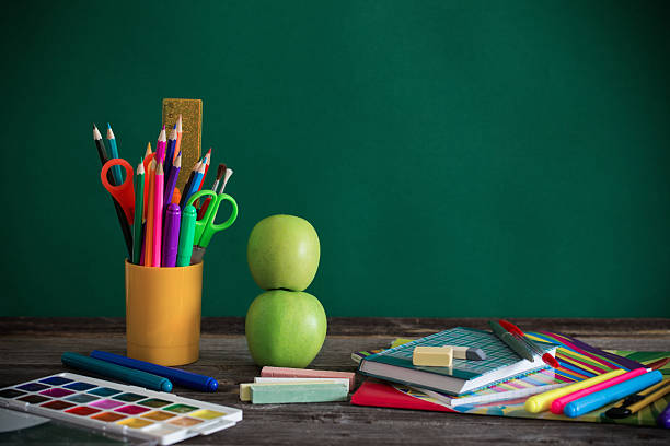 istock school stationary on wooden table 588984622