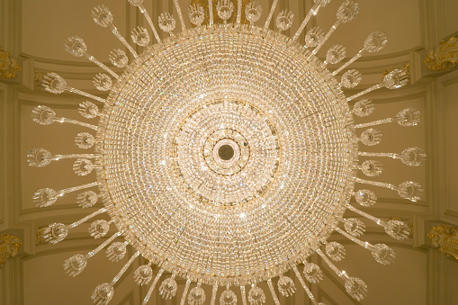 Luxurious crystal chandelier in Istanbul shot from below 