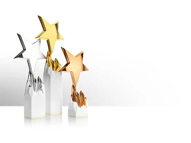 gold, silver and bronze star award  on a light background with space for text