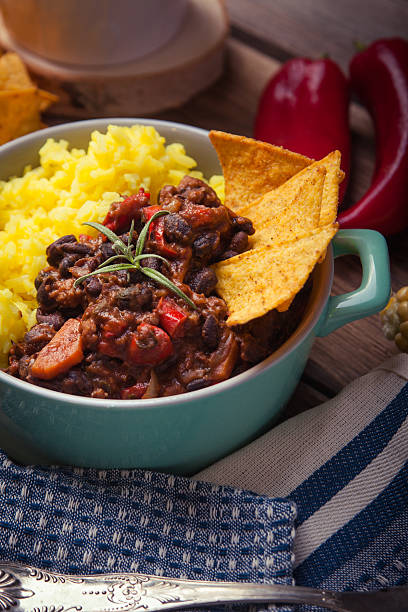 istock Homemade chilli con carne with beans, pepper and rice 588987728