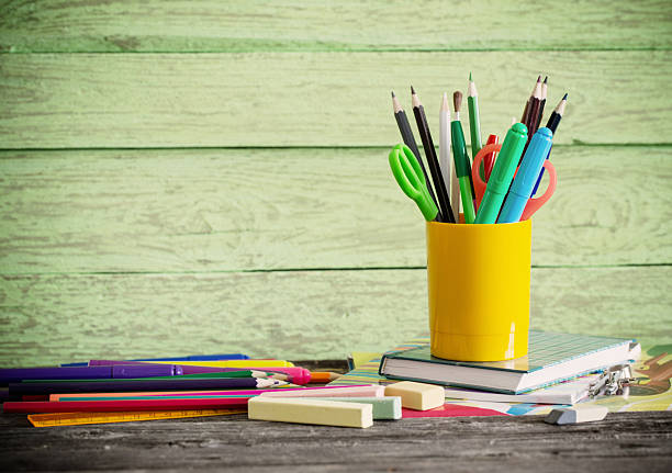 istock school stationary on wooden table 588987918