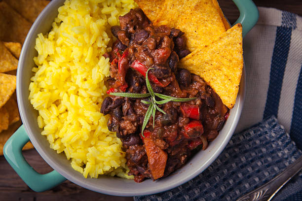 istock Homemade chilli con carne with beans, pepper and rice 588987940