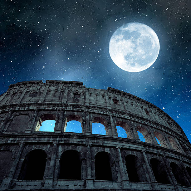 flavian amphitheatre or colosseum in rome - rome coliseum night famous place imagens e fotografias de stock