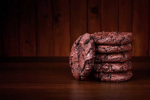 Double chocolate cookies on a wooden table