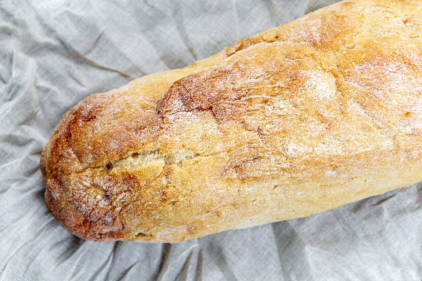 istock Top view of fresh organic ciabatta bread 588993216
