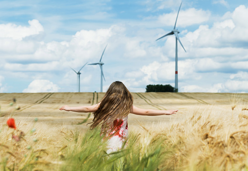 Girl infant of wind turbines