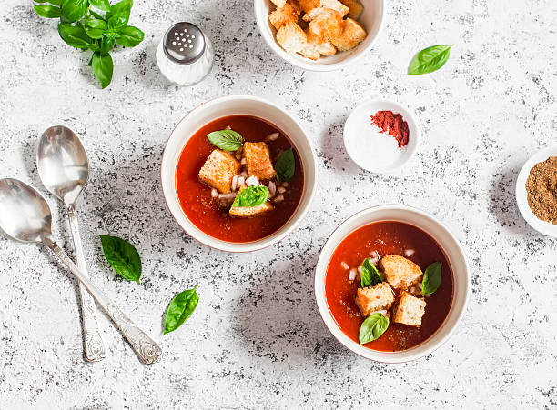 istock Cold tomato soup gazpacho with croutons and basil 588993770