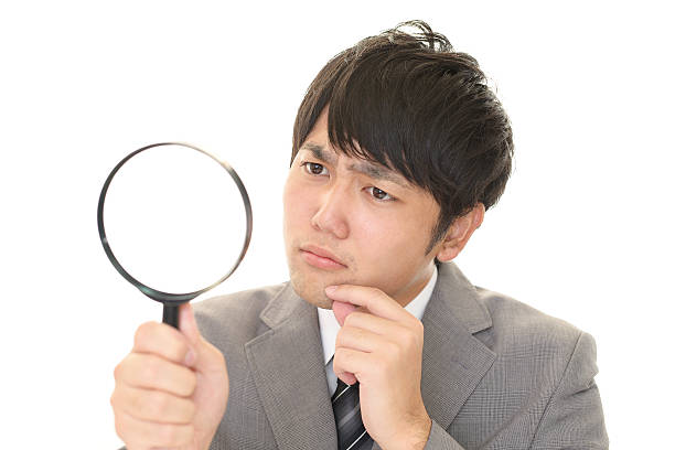 istock Uneasy Asian Businessman 588995924