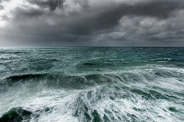 istock Winter storm over ocean with rough seas 588997978