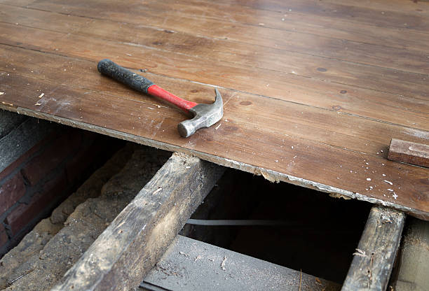 DIY Home Improvement - Old floorboards being ripped up to be replaced