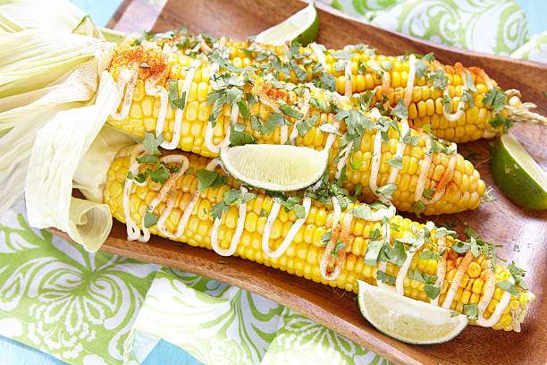 istock grilled corn with chili peppers, white sauce and herbs 589086924