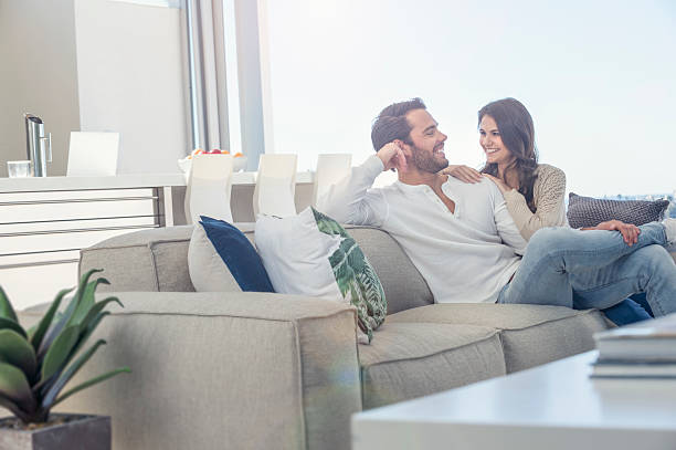 istock Couple relaxing on the sofa. 589087718
