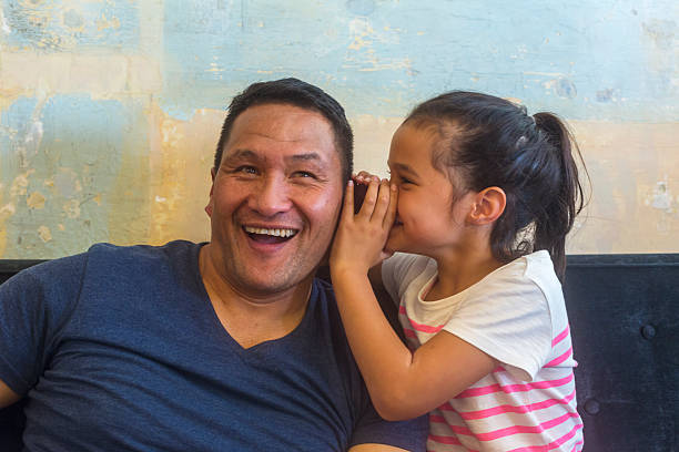 Maori Pacific Islander Father and Daughter Family Having Fun Together Family couple of a father and daughter Maori Pacific Islander having fun together pacific islander ethnicity stock pictures, royalty-free photos & images