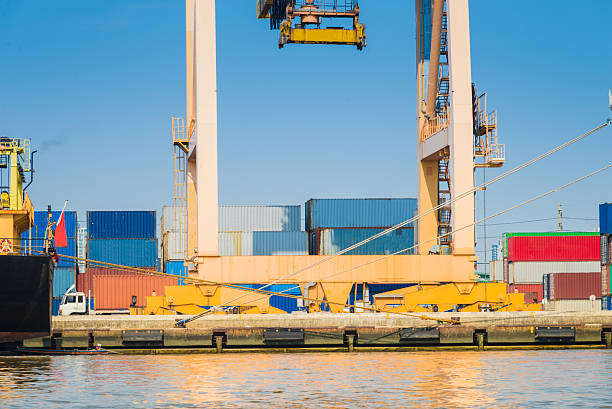 istock Industrial port and Container ship logistic the harbor in Asia , 589098142