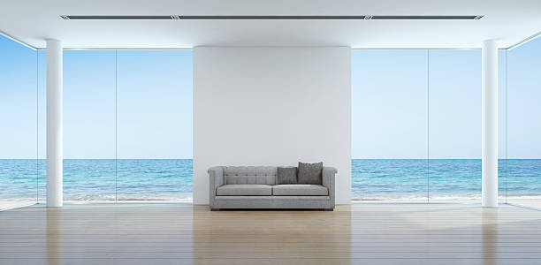 istock Sea view living room interior in modern beach house 589098256
