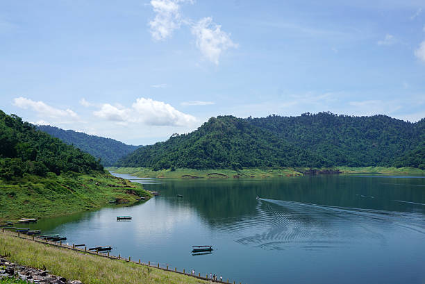 istock Beautiful tropical forest from the dam 589101620