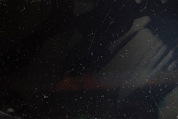 Old dusty black digital screen with cracks Old dusty black digital screen with cracks. Broken screen of smartphone, tablet, laptop, tv-set monitor close-up. Damaged device background black glass surface stock pictures, royalty-free photos & images